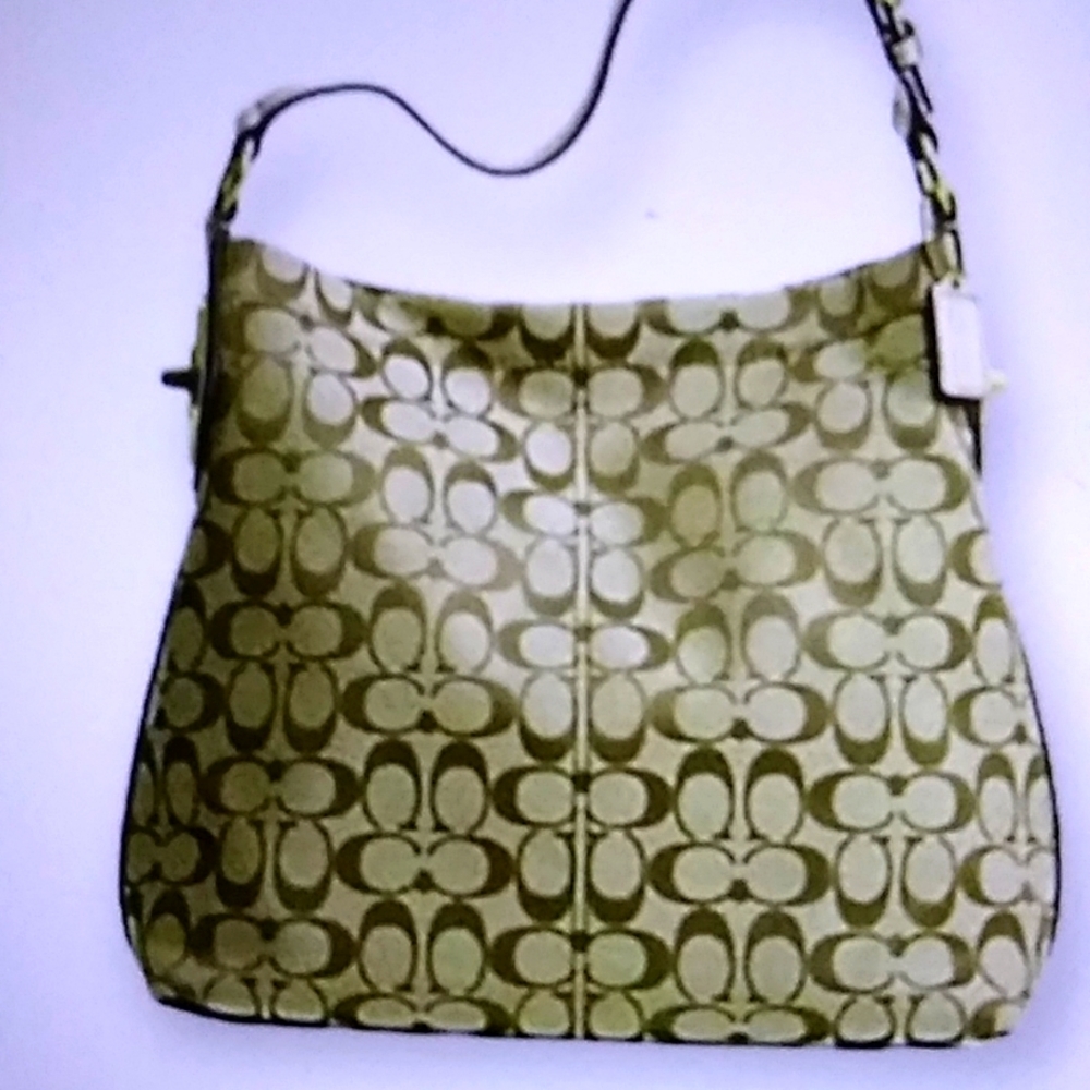 GUC. Coach tan signature Penelope shoulder hobo bag.